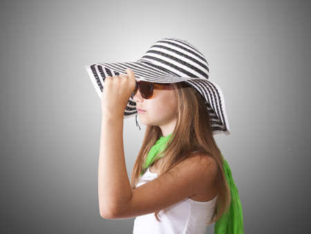 girl with hat and green scarfの写真素材