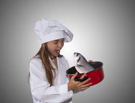 young chef with potの写真素材