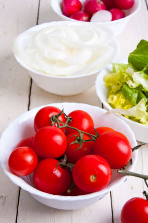 fresh and natural ingredients of a vegetarian diet and saladsの写真素材