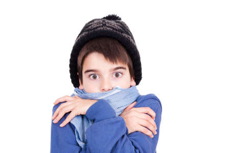 child warm in winter clothes on white background の写真素材