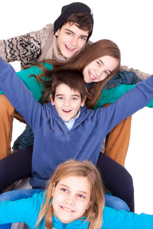 group of happy young boys over white backgroundの写真素材