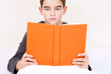 Little boy read a bookの写真素材