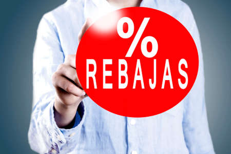 businessman pressing circle discounts rebates
