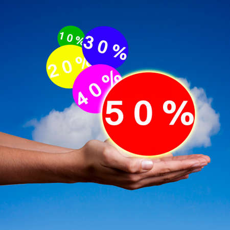 businessman pressing circle discounts rebatesの写真素材