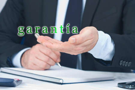 businessman offering his hand in warrantyの写真素材