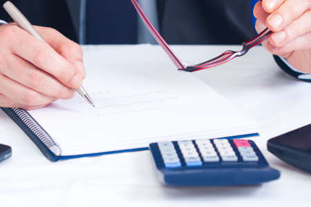 Businessman working in the office in the foreground