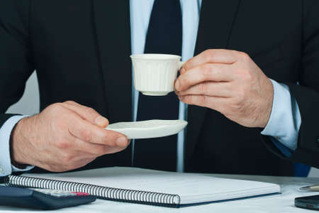 Foreground lifestyle businessman in suit and tieの写真素材