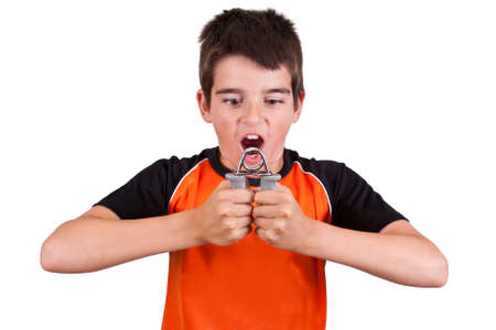 boy doing gymnastics with weights on white backgroundの写真素材