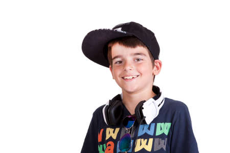 child with current clothing listening to music with headphones