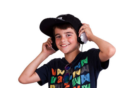 child with current clothing listening to music with headphonesの写真素材