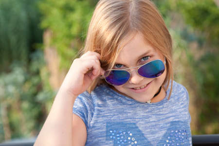 portrait of girl in the foreground with long hairの写真素材