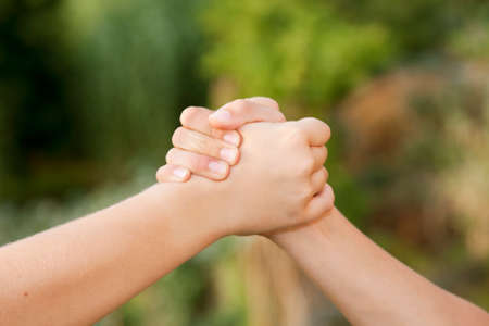 hands together in strength and unity conceptの写真素材