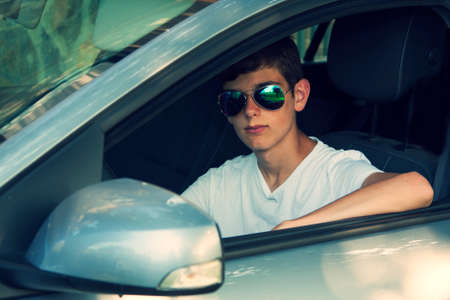 happy people traveling by car, vintage effectの写真素材