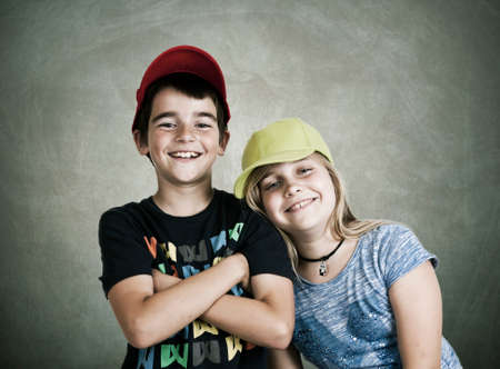 portrait of couple of caps Children with currentの写真素材