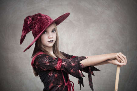 girl with hat halloween costumeの写真素材