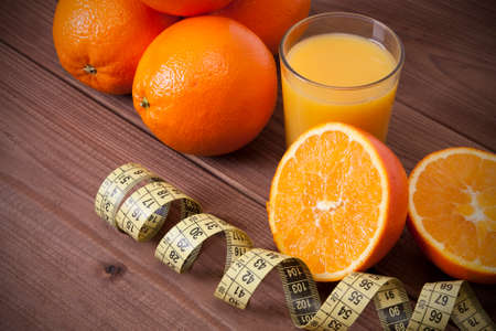 fresh oranges and tapeの写真素材