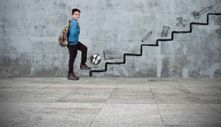 child in the scale of educationの写真素材