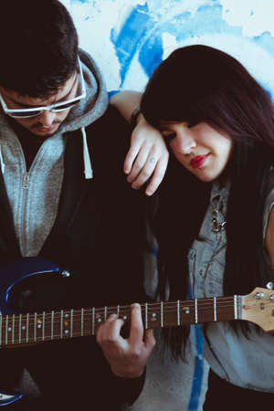 couple with electric guitarの写真素材