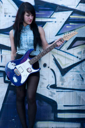girl with electric guitarの写真素材