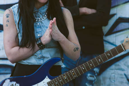 couple with electric guitarの写真素材