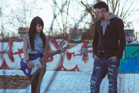 couple with electric guitarの写真素材