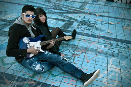 couple with electric guitarの写真素材