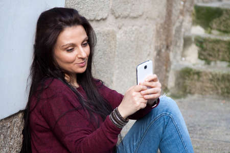 by becoming a selfie girl with phoneの写真素材