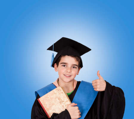 child with graduation robeの写真素材