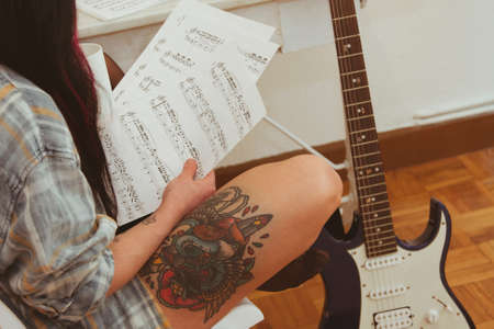 home young girl playing guitarの写真素材