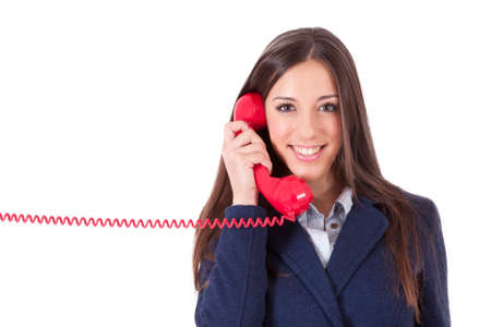 girl talking on the phone isolated cordonの写真素材