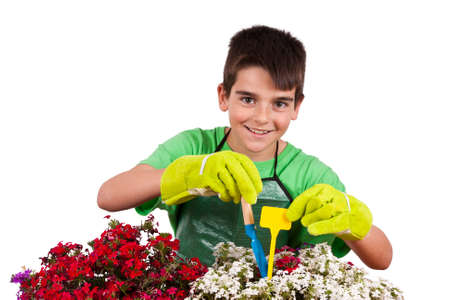 child preparing garden plantsの写真素材