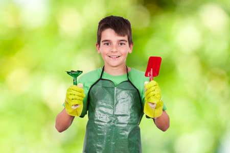 child with garden plants isolated on whiteの写真素材
