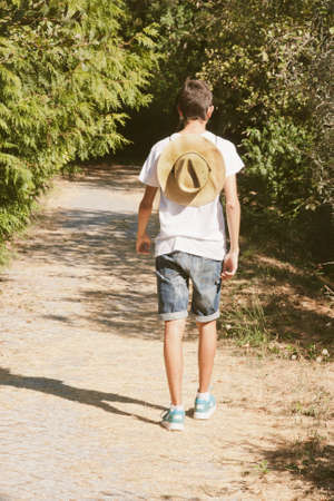 teen walking outdoorsの写真素材
