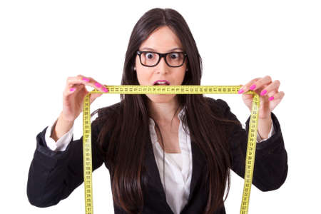 business woman with tape measureの写真素材