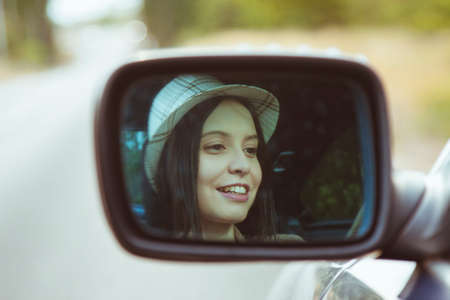 girl in the car drivingの写真素材