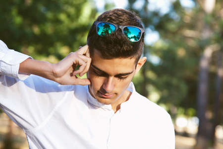 portrait of young teenage girl outdoorsの写真素材