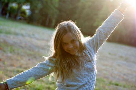 Portrait of girl in the forest in autumnの写真素材