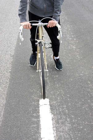 young boy with bike outdoors