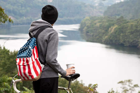 Teen with bike outdoorsの写真素材