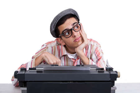 pensive man with typewriterの写真素材