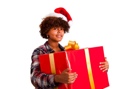 african american girl with christmas giftの写真素材