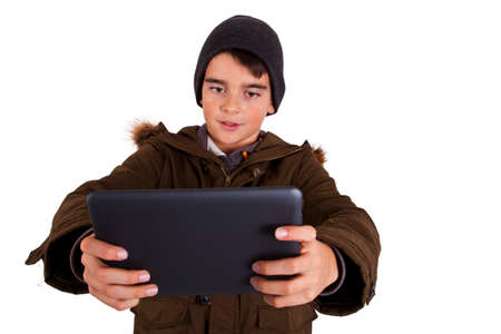 Child with tablet isolated on white background