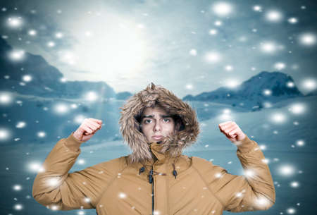 snow man in warm winter clothesの写真素材