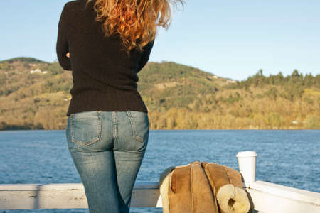 Woman on the pier watching the scenery