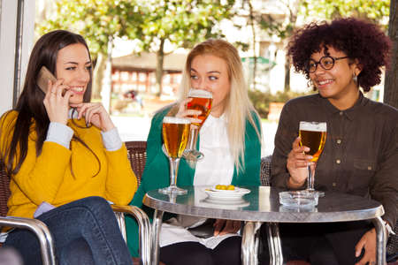 girlfriends in the city having drinks