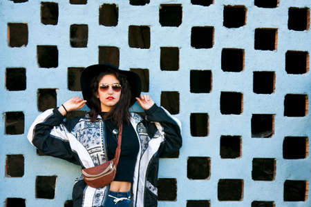 hipster girl on the wallの写真素材