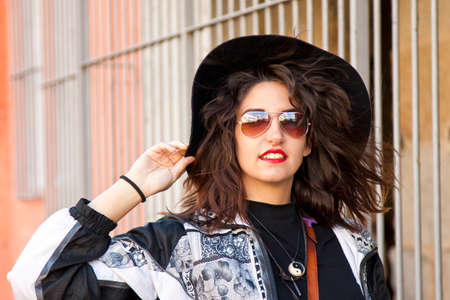 cheerful girl on city street fashionの写真素材