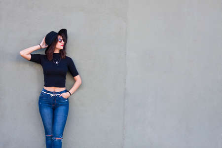 hipster girl on the wallの写真素材