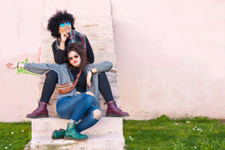 girls on the stairs streetの写真素材