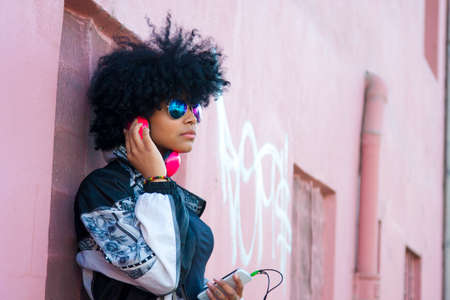 listening to music on the streetの写真素材